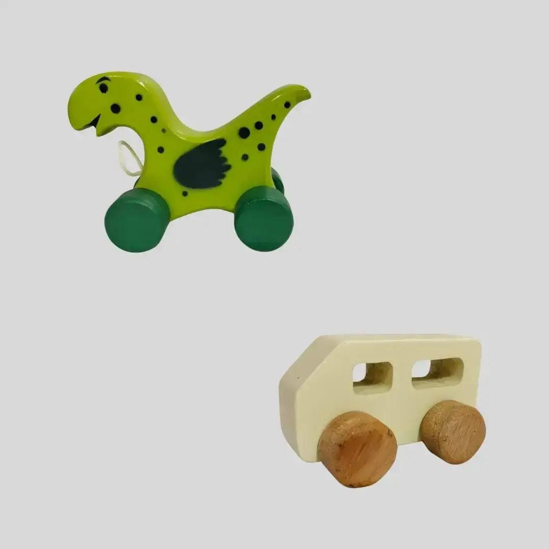 Wooden dinosaur-shaped pull toy alongside a wooden van toy for children