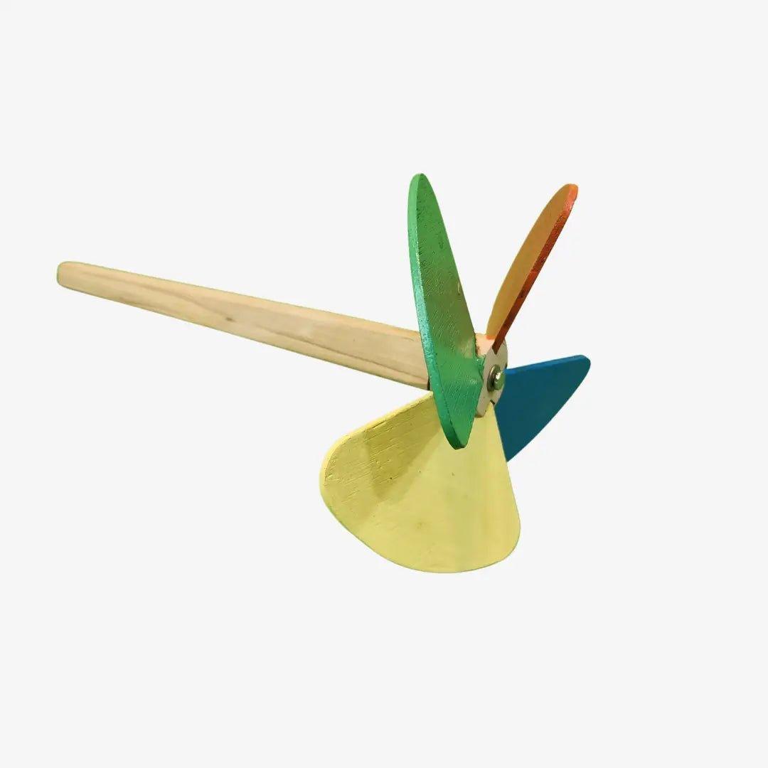  a toy with a wooden handle and two blades
